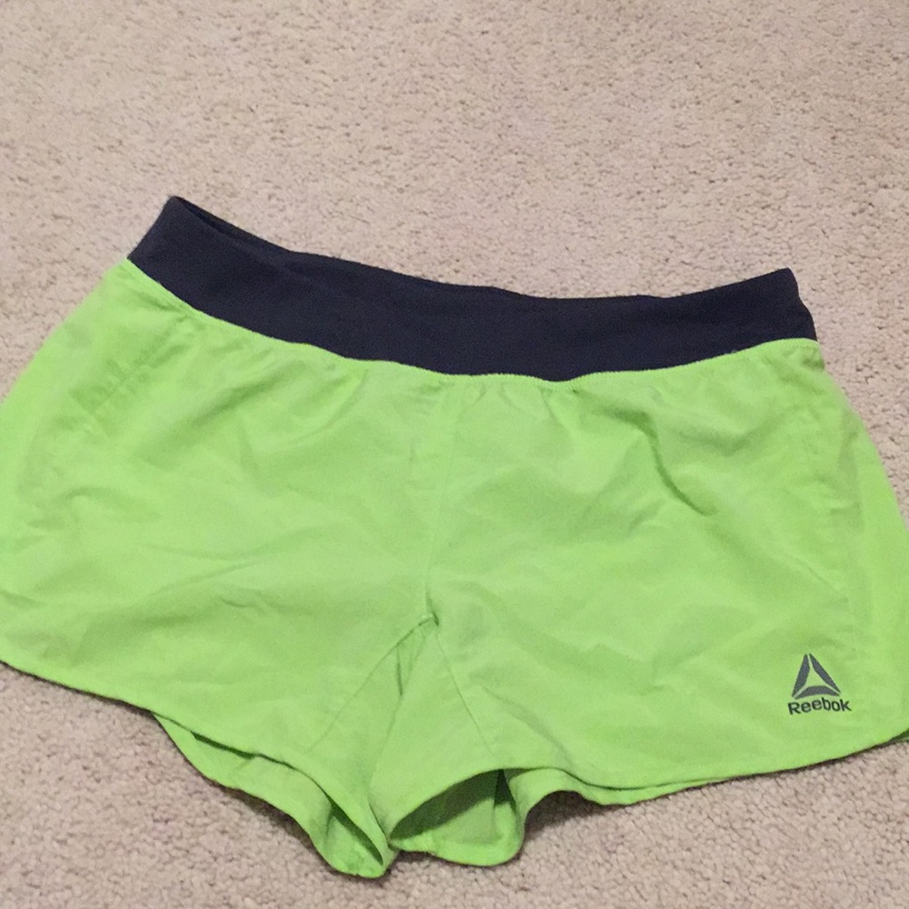 Green Reebok shorts
